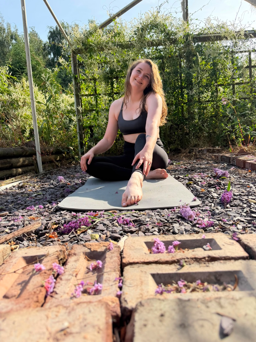 Faith on her mat in the garden
